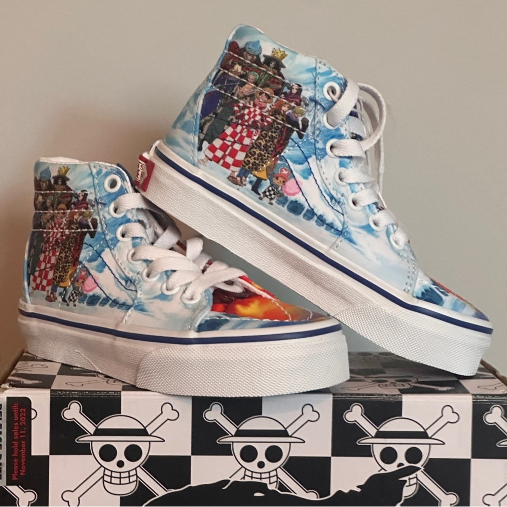 One Piece Vans | toddler size 10.5 |